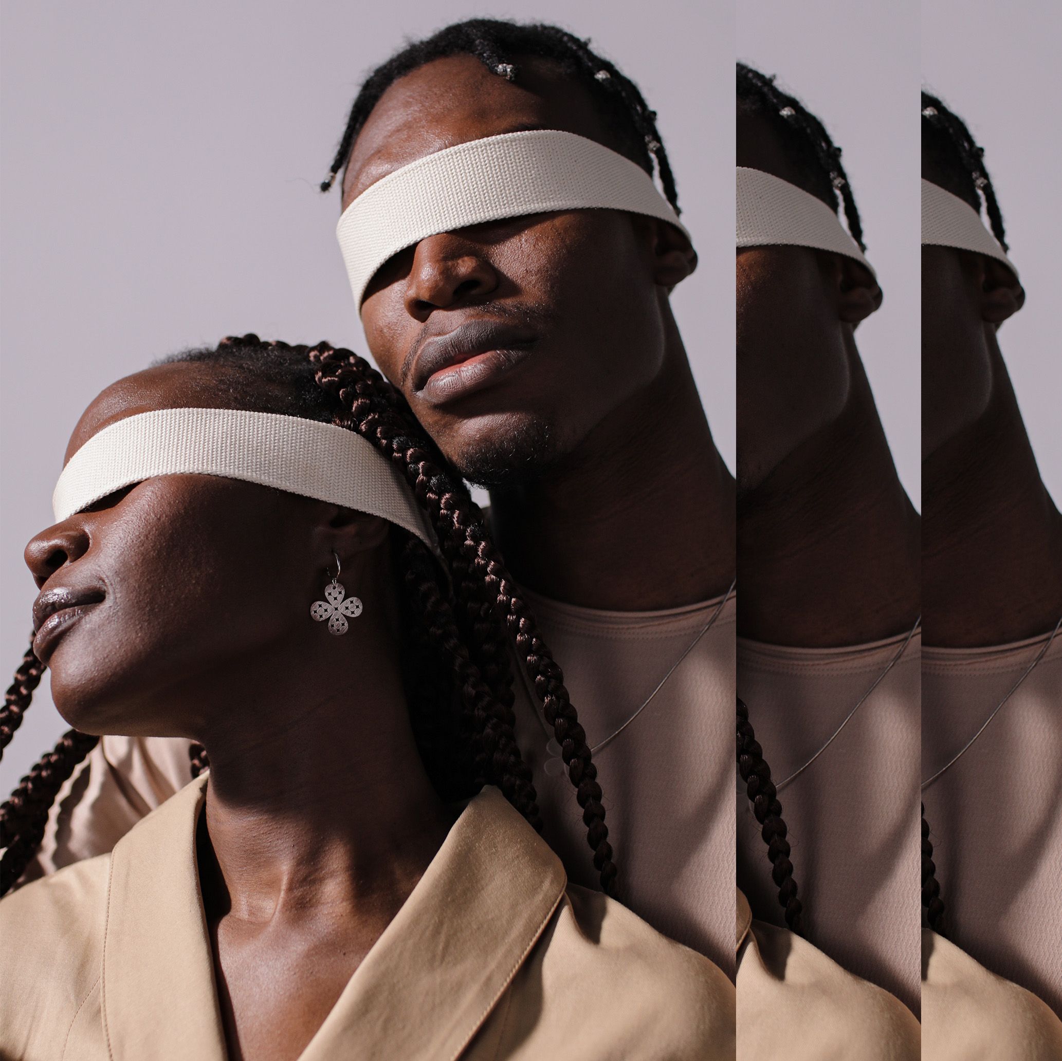 Partnership between two people blind folded
